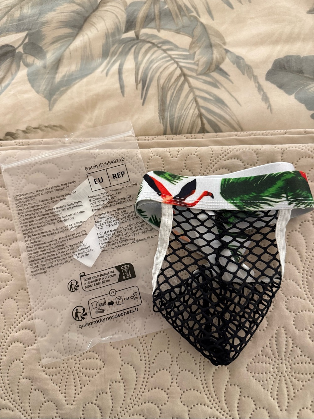 Men's fishnet g-string with palm pattern waistband